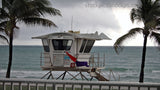 Lifeguard Stand Ready for Storm Florida Beach Atlantic Coast Palm Trees Gray Sky