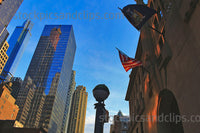 NYC New York City Scene Buildings U.S. Flag Sky Lamp Post