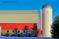 The Country Silo Pine Trees Shadow the Red Barn Blue Sky and Snow on the Ground